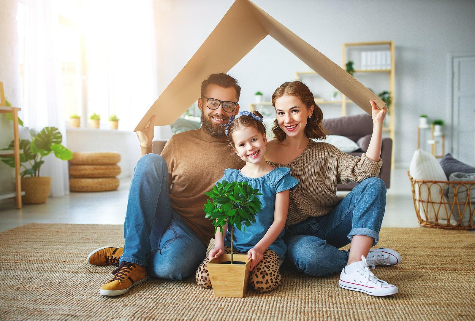 happy family under energy efficient roof