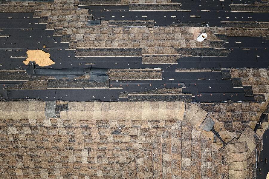 wind damage roof shingles missing